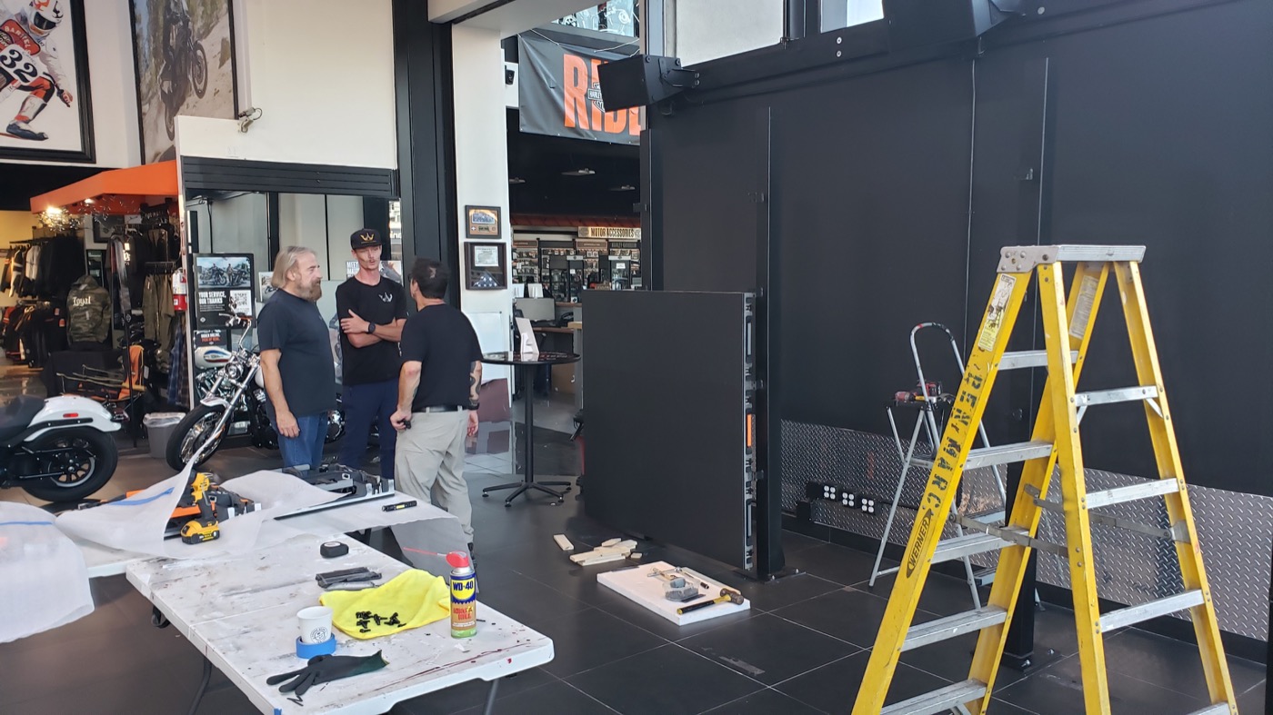 The RizzoPro Studios crew installing the video wall at Bartels Harley-Davidson